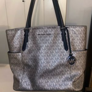 Michael Kors purse like new with tags .